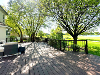 Classic composite deck with graceful staircase in Alpharetta, GA